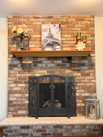 a stove top oven sitting inside of a kitchen