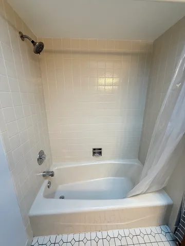 a bathroom with a bathtub