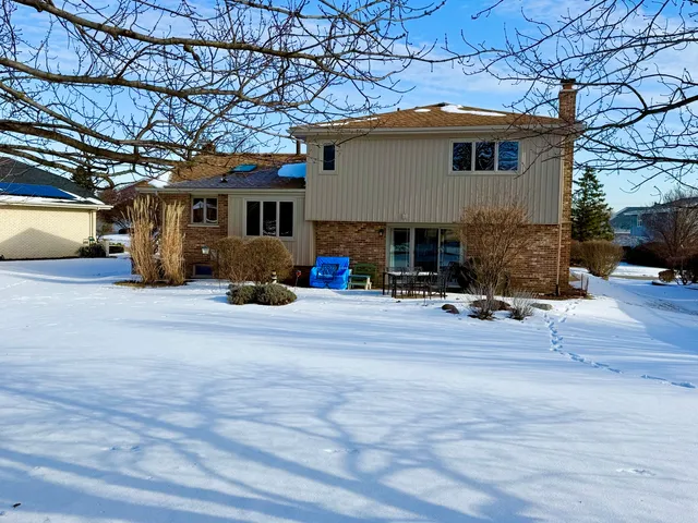 a view of a house with a patio