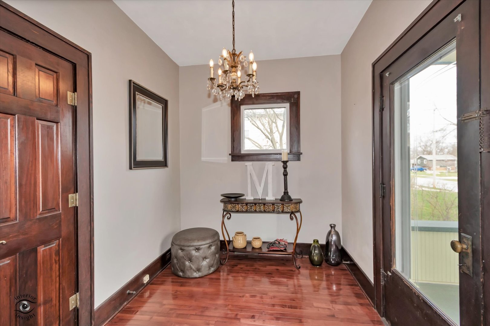 256 Center Road Frankfort, IL 60423 - Photo 6 of 26 a room with chandelier fan and windows