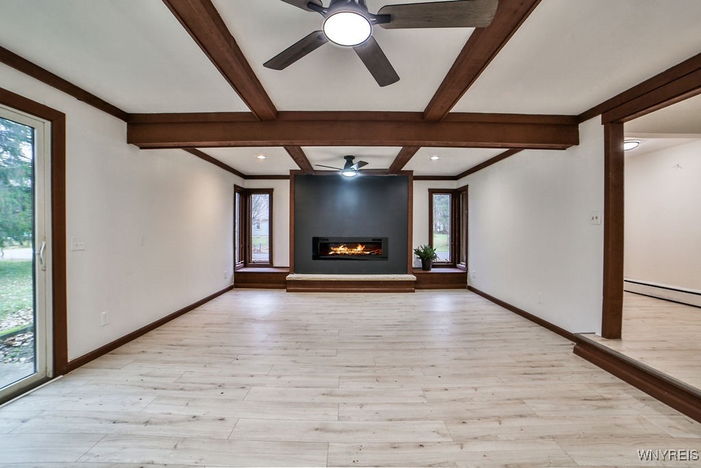 8567 Fairview Terrace Colden, NY 14033 - Photo 13 of 41 Family room with fireplace off living room and foy