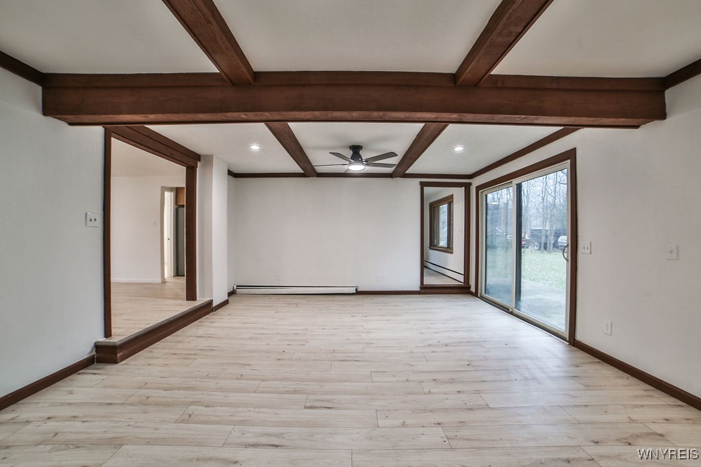 8567 Fairview Terrace Colden, NY 14033 - Photo 20 of 41 Expansive family room with double ceiling fans and
