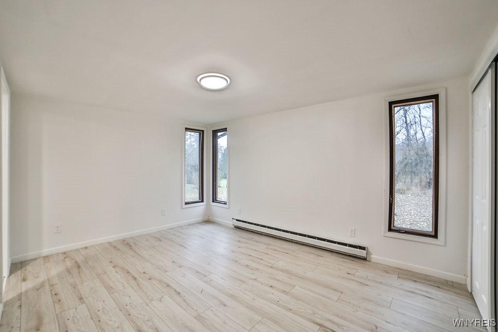 8567 Fairview Terrace Colden, NY 14033 - Photo 24 of 41 Primary bedroom with plenty of natural light and c