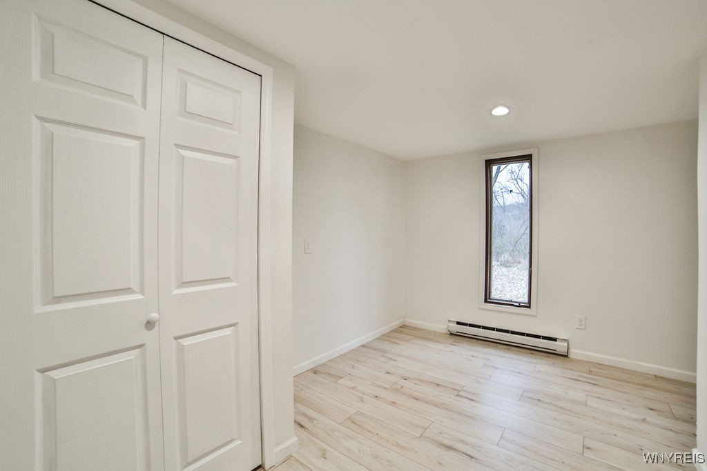 8567 Fairview Terrace Colden, NY 14033 - Photo 26 of 41 Bedroom 2 with double closet and recessed lighting
