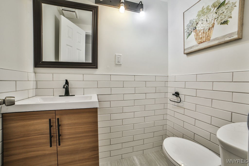 8567 Fairview Terrace Colden, NY 14033 - Photo 29 of 41 Fully remodeled half bath with subway tile.