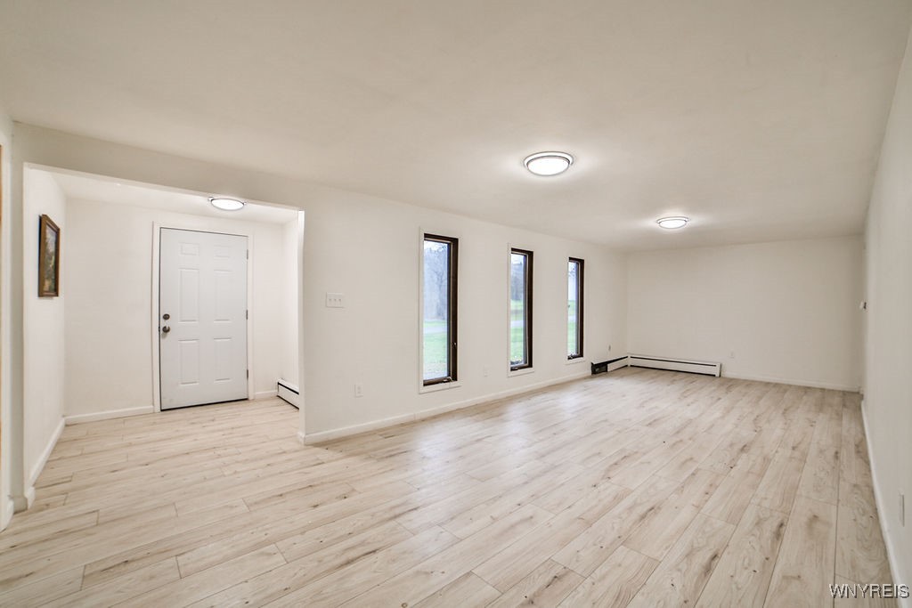 8567 Fairview Terrace Colden, NY 14033 - Photo 4 of 41 Spacious Living room (26x11) with large entry foye