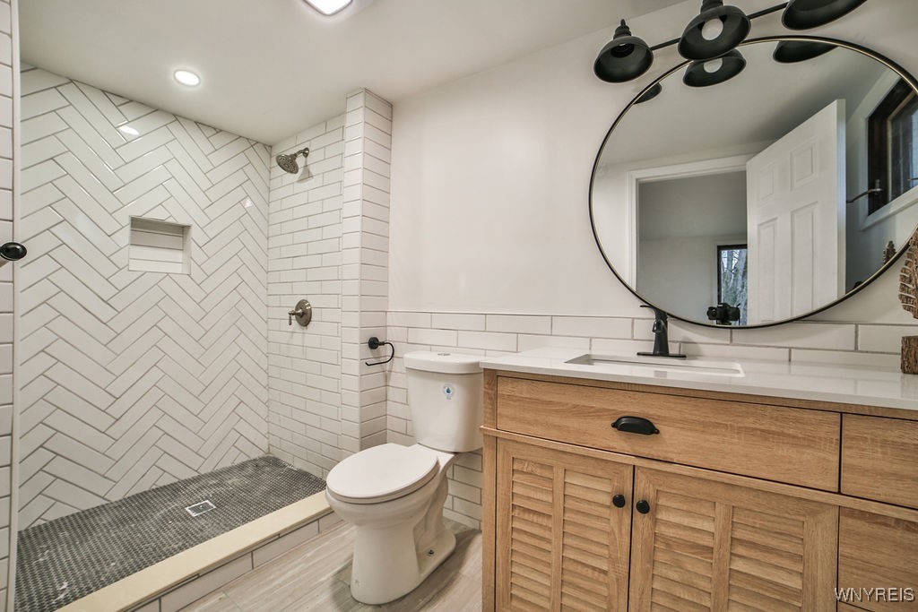 8567 Fairview Terrace Colden, NY 14033 - Photo 7 of 41 Wow, what a stunning primary bath, fully remodeled