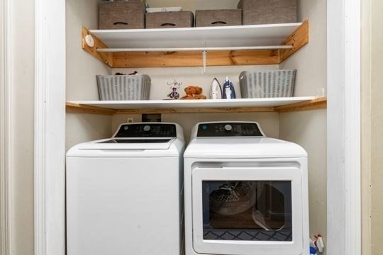 17 Greendale Road, Unit 2F Boston, MA 02126 - Photo 16 of 26 a utility room with dryer and washer