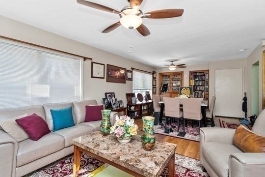17 Greendale Road, Unit 2F Boston, MA 02126 - Photo 8 of 26 a living room with furniture or couch and a ceiling fan