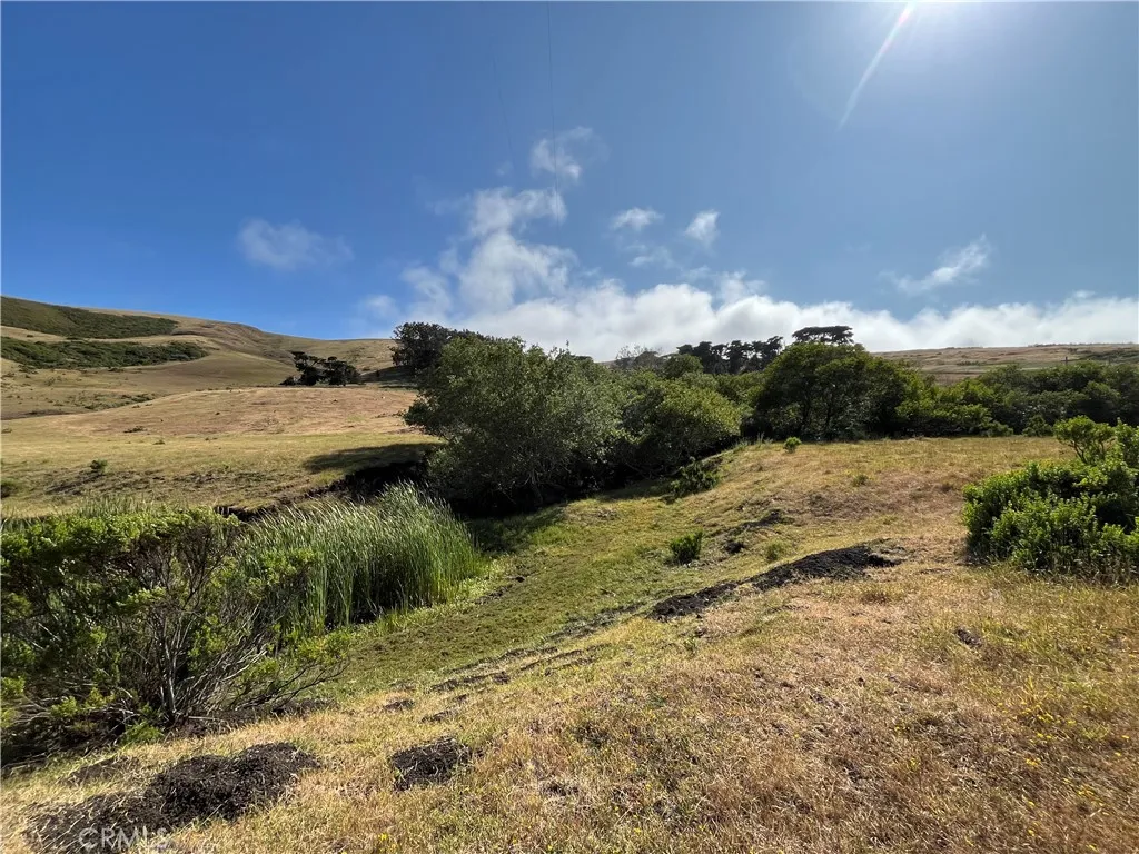 0 Ca-1 Cayucos, CA 93430 - Photo 46 of 63 a view of a lake with a yard