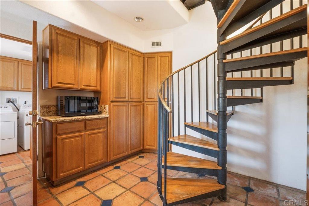 3577 Stonegate Place Fallbrook, CA 92028 - Photo 13 of 60 Off the kitchen a butlers pantry to do prep work with an abundance of storage