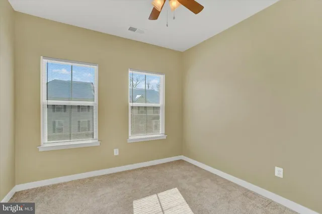 a workspace with furniture and window