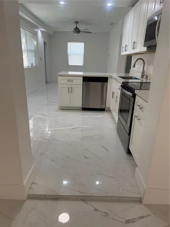 a view of a hallway with closet area