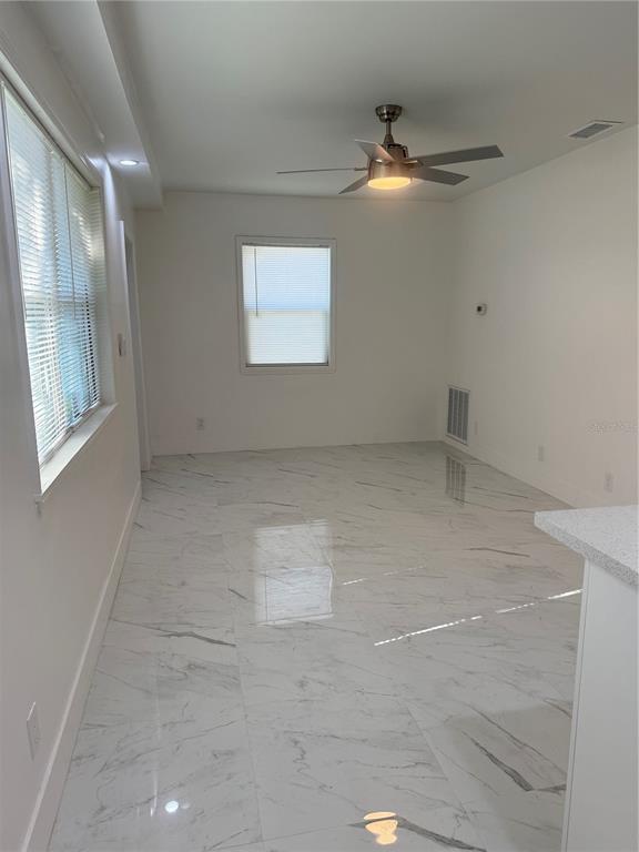 305 Ann Street Edgewater, FL 32132 - Photo 29 of 45 a view of an empty room with a window