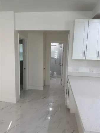 en empty room with windows