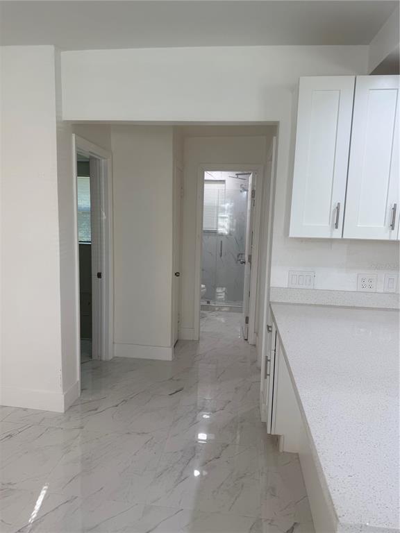 305 Ann Street Edgewater, FL 32132 - Photo 30 of 45 a view of a hallway with closet area