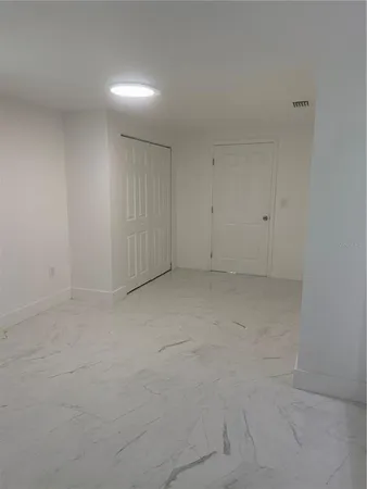 a bathroom with a toilet sink and a shower