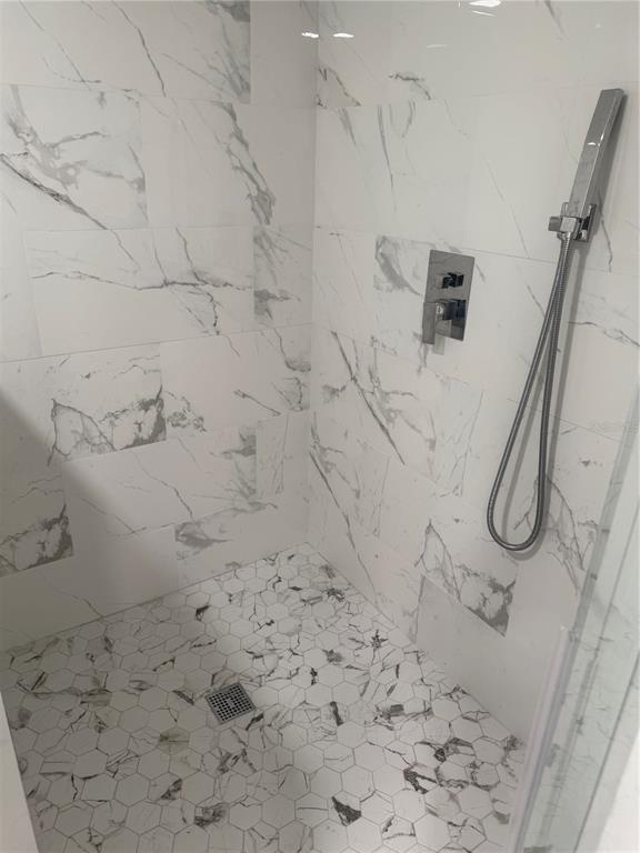 305 Ann Street Edgewater, FL 32132 - Photo 45 of 45 a bathroom with a shower