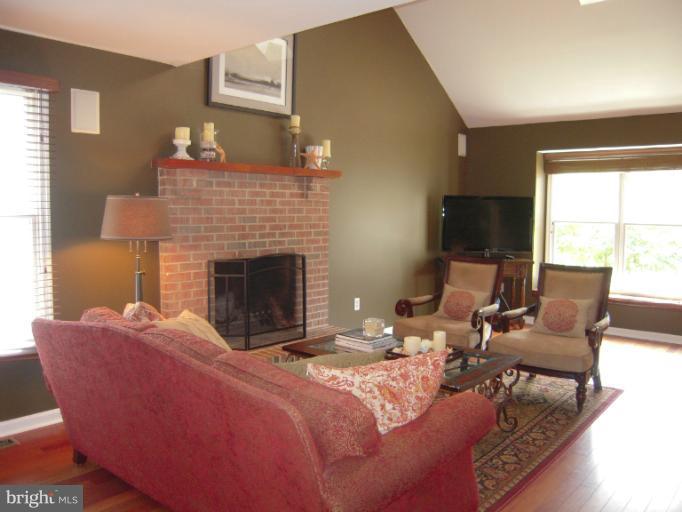 50 Ridge Avenue Edgewater, MD 21037 - Photo 22 of 30 Living Room with Wood Burning Fireplace