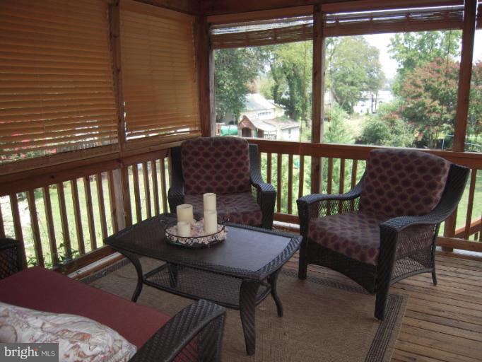 50 Ridge Avenue Edgewater, MD 21037 - Photo 5 of 30 Screened Porch Located off of the Kitchen