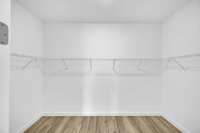 a view of a room with racks on the wall