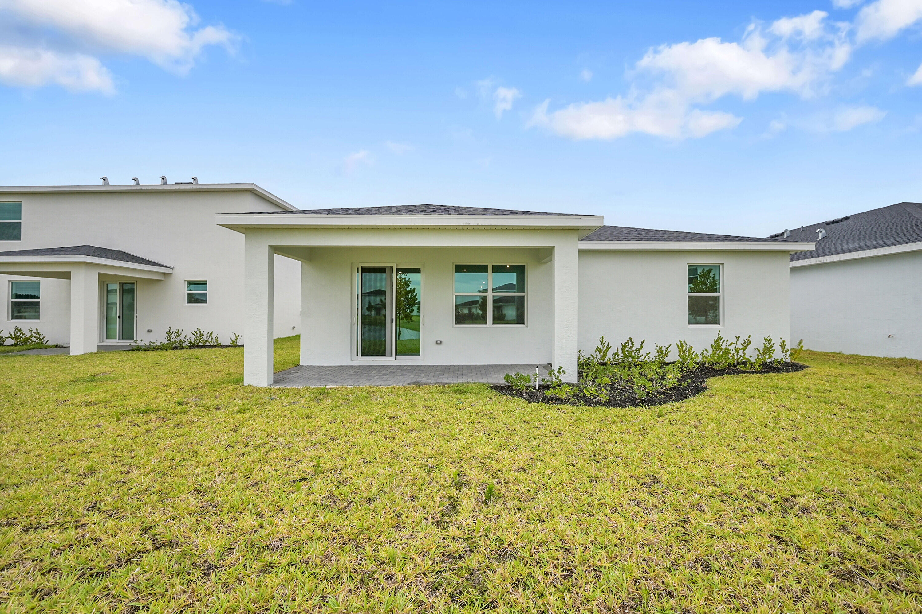 3501 Harborside Avenue Fort Pierce, FL 34946 - Photo 27 of 31 a view of a house with backyard and garden