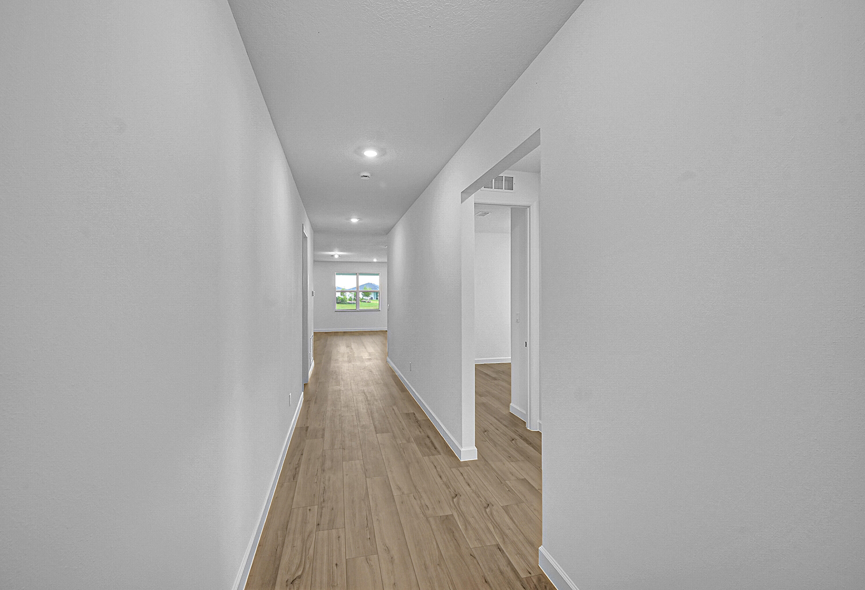3501 Harborside Avenue Fort Pierce, FL 34946 - Photo 5 of 31 a view of a hallway with wooden floor