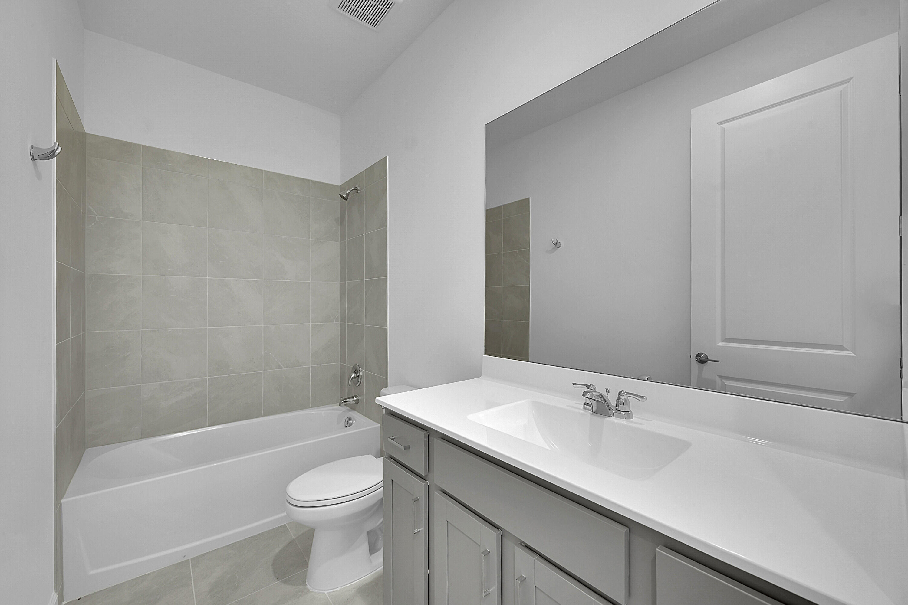 3501 Harborside Avenue Fort Pierce, FL 34946 - Photo 8 of 31 a bathroom with a sink a toilet and shower