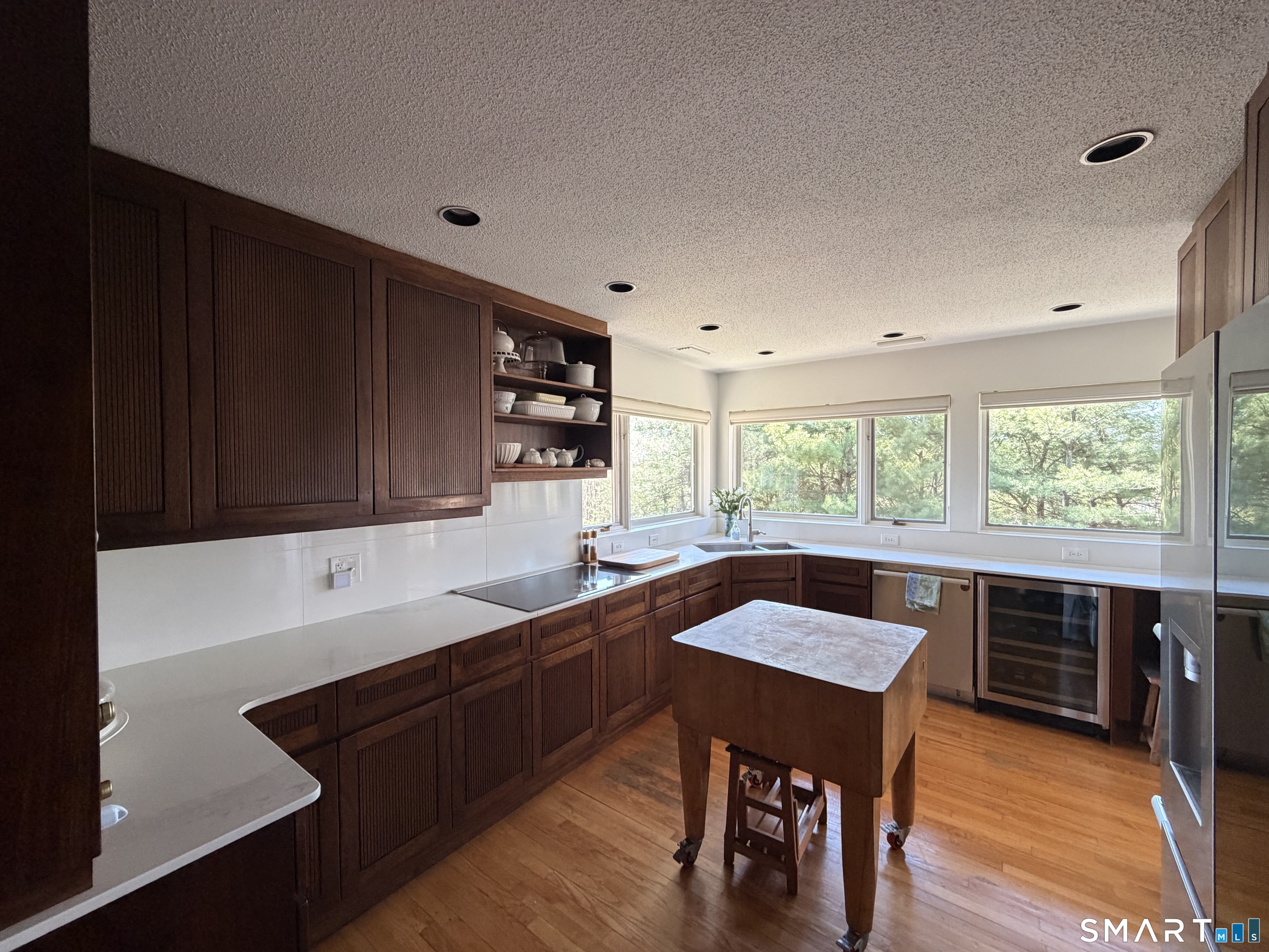 86 Washburn Road Canton, CT 06019 - Photo 6 of 40 a kitchen with a table chairs sink and cabinets