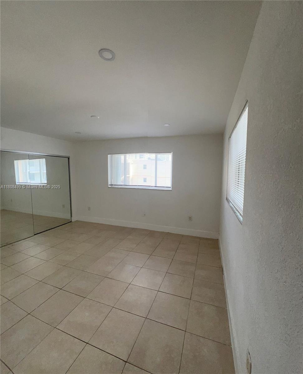 Edgewater Miami, FL 33137 - Photo 15 of 29 a view of an empty room and window