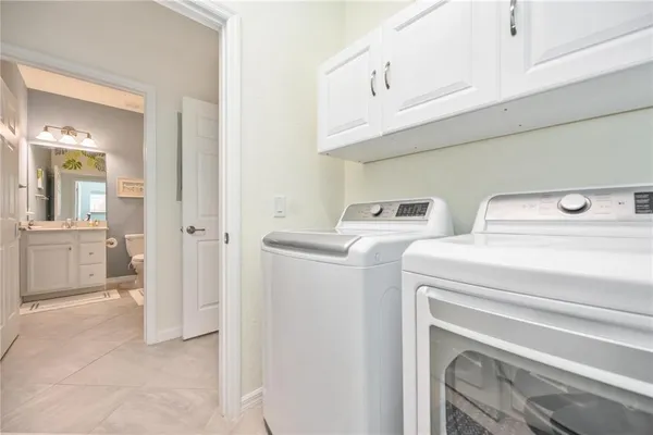 a living room with furniture and windows