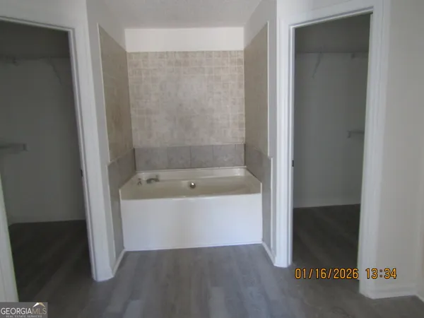 a bathroom with a bathtub