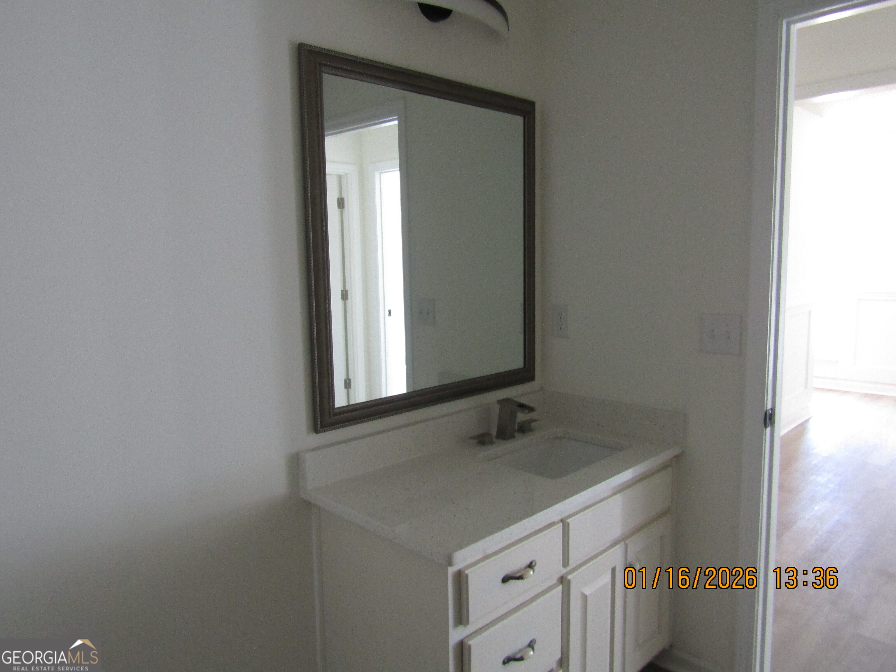 7358 Stilson-Leefield Road Brooklet, GA 30415 - Photo 21 of 24 a bathroom with a sink and a mirror