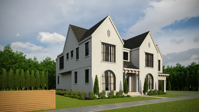 a view of a white house with a yard and plants