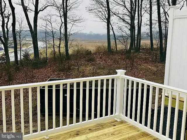 a view of a wooden fence