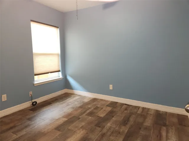 a view of a room with an empty space