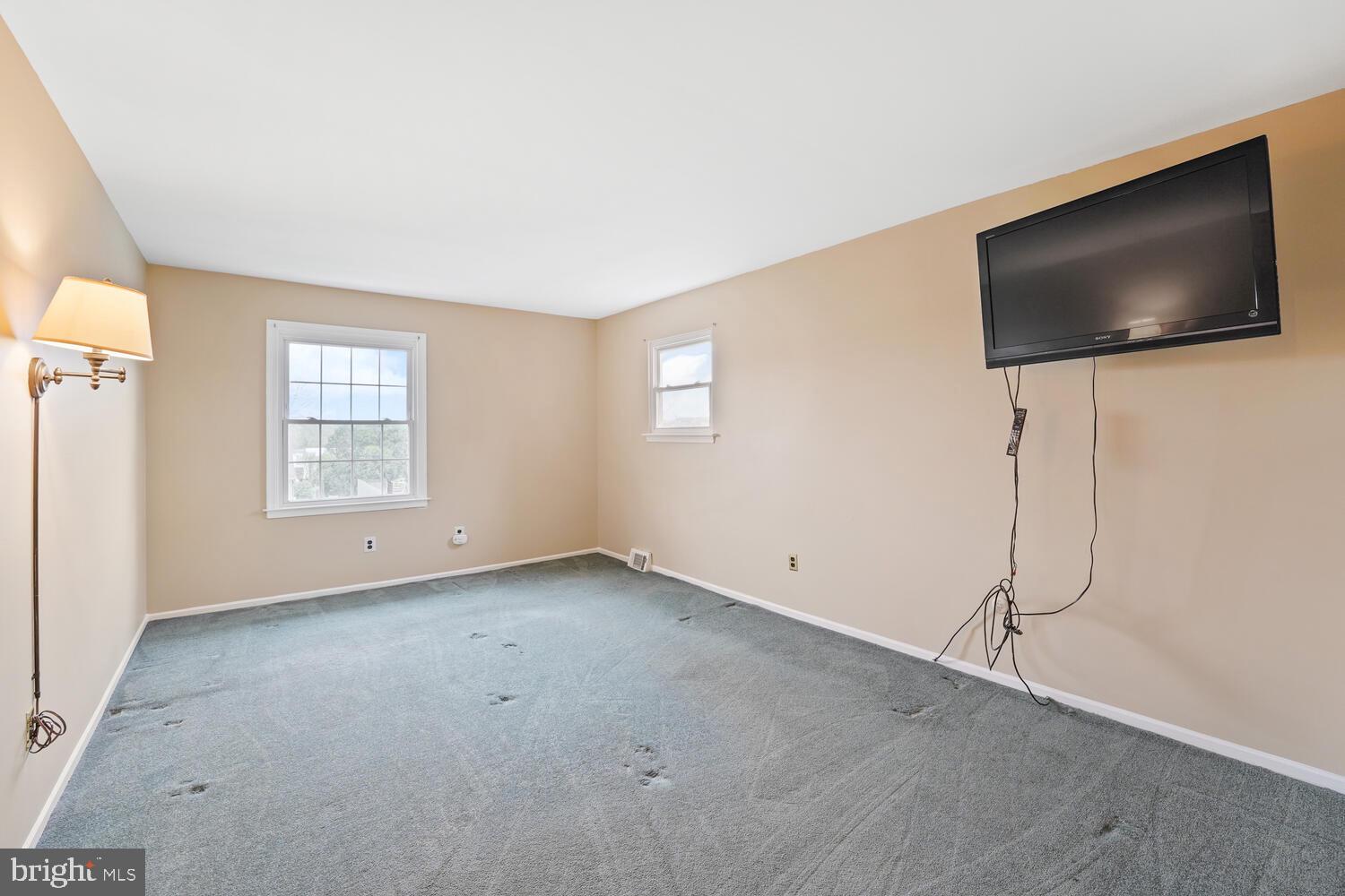 807 South Mill Road Kennett Square, PA 19348 - Photo 19 of 38 Primary Bedroom w/ wall mounted tv