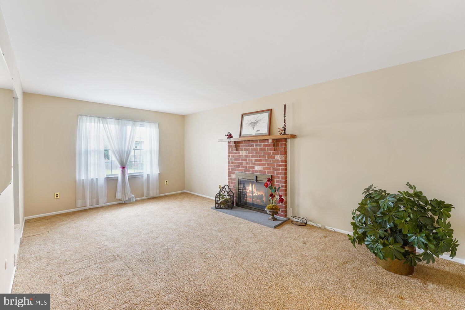 807 South Mill Road Kennett Square, PA 19348 - Photo 10 of 38 Family Rm, Brick Fireplace w/ propane gas log