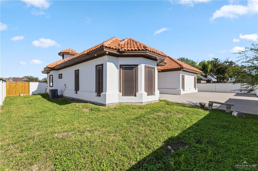 513 Mi Vida Street Weslaco, TX 78596 - Photo 22 of 22 a view of a house with a yard