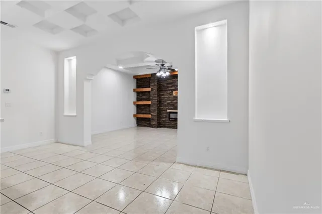 a view of walk in closet with clothes