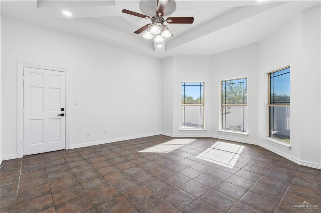 513 Mi Vida Street Weslaco, TX 78596 - Photo 9 of 22 a view of an empty room with a window