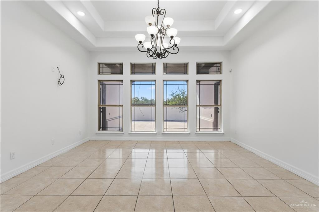 513 Mi Vida Street Weslaco, TX 78596 - Photo 10 of 22 a view of an empty room with a window