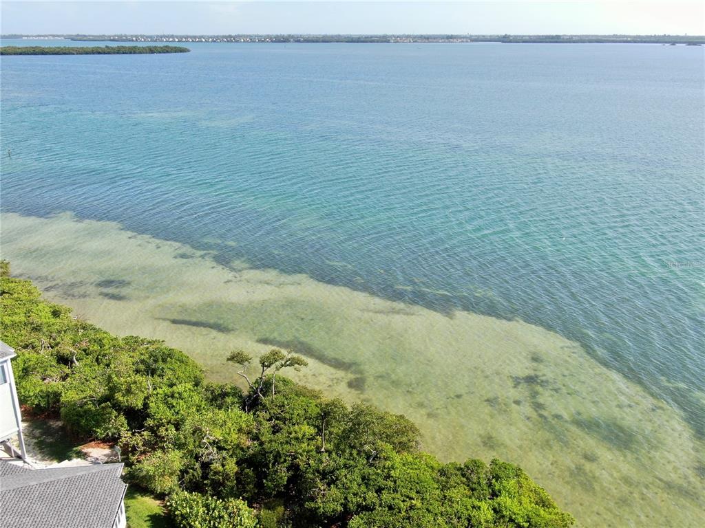 848 Evergreen Way Longboat Key, FL 34228 - Photo 40 of 66 a view of an ocean beach