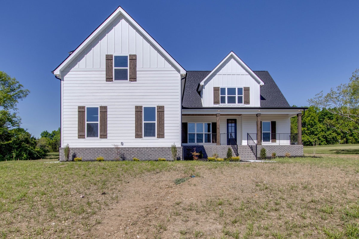 7311 North Milton Road Milton, TN 37118 - Photo 1 of 54 a view of a yard in front of house