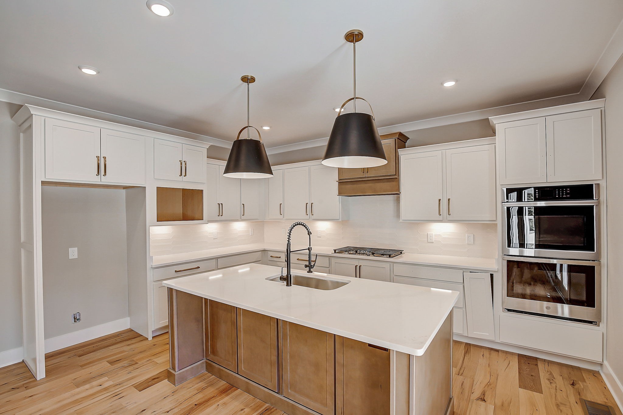 7311 North Milton Road Milton, TN 37118 - Photo 16 of 54 a kitchen with kitchen island a sink stainless steel appliances and cabinets