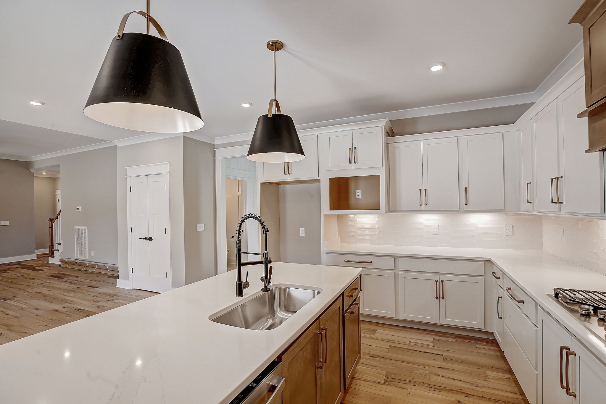 7311 North Milton Road Milton, TN 37118 - Photo 17 of 54 a kitchen with kitchen island granite countertop a sink stainless steel appliances and cabinets