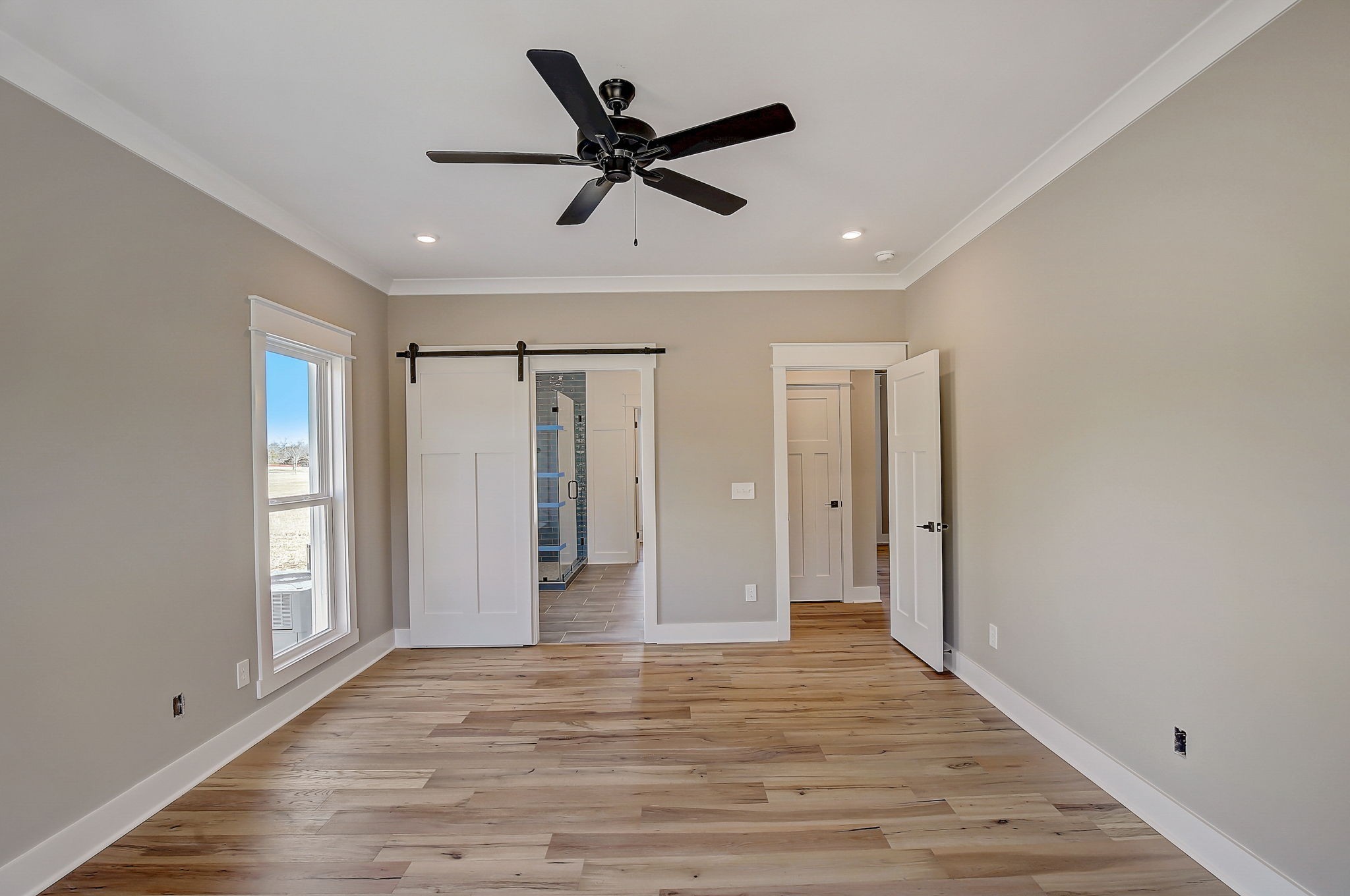 7311 North Milton Road Milton, TN 37118 - Photo 21 of 54 a view of a livingroom with a ceiling fan & entryway