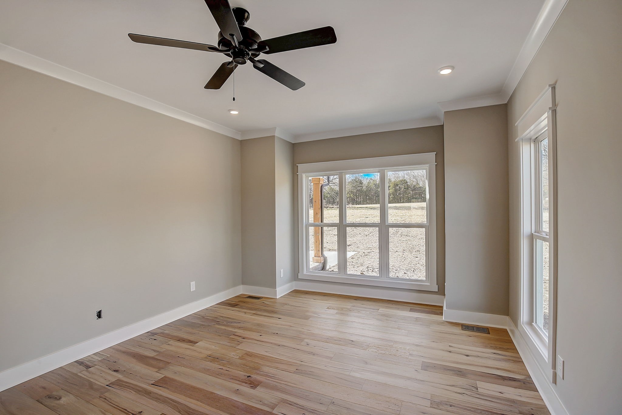 7311 North Milton Road Milton, TN 37118 - Photo 22 of 54 wooden floor in an empty room with a window