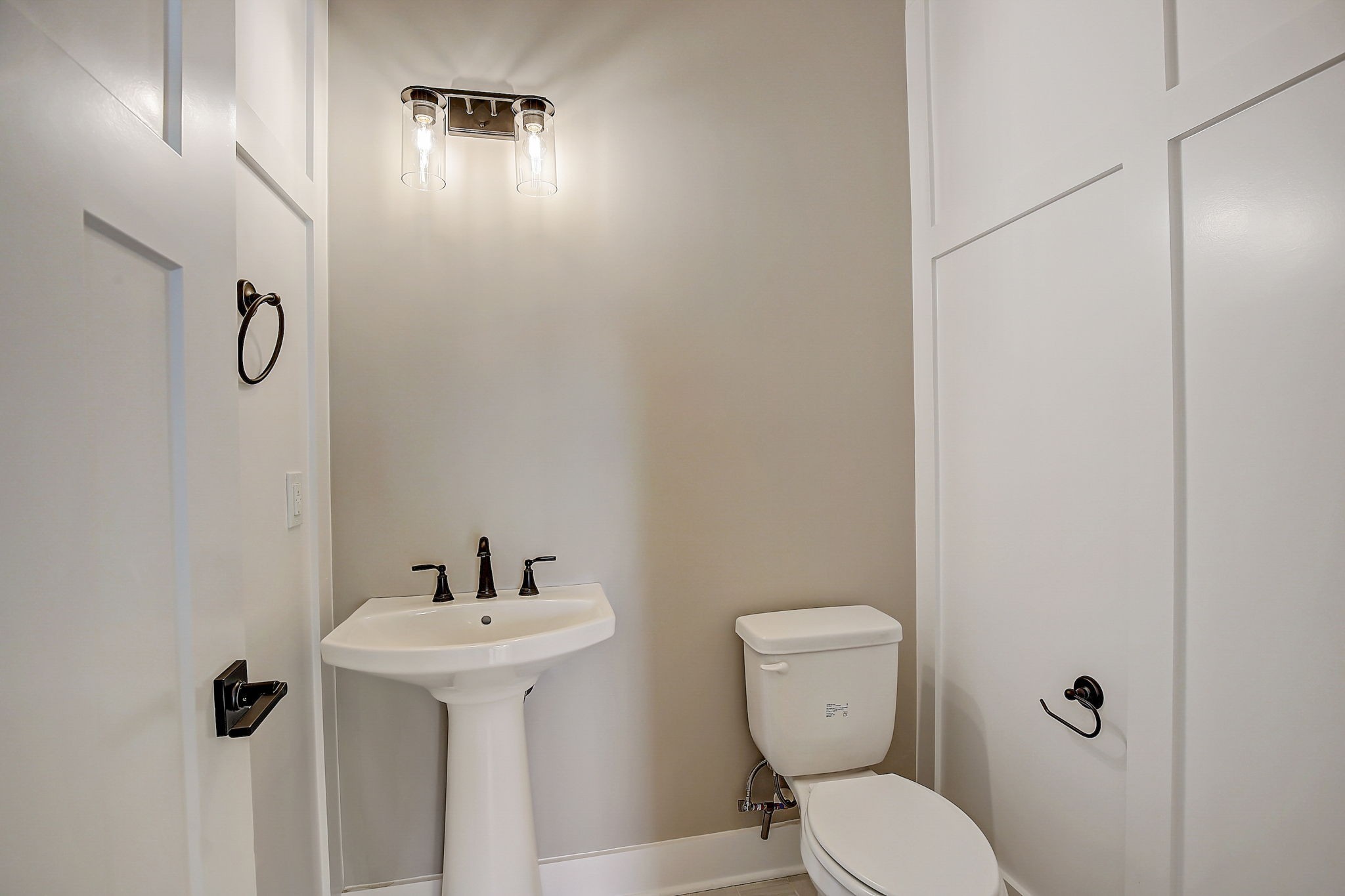 7311 North Milton Road Milton, TN 37118 - Photo 28 of 54 a bathroom with a toilet sink and mirror