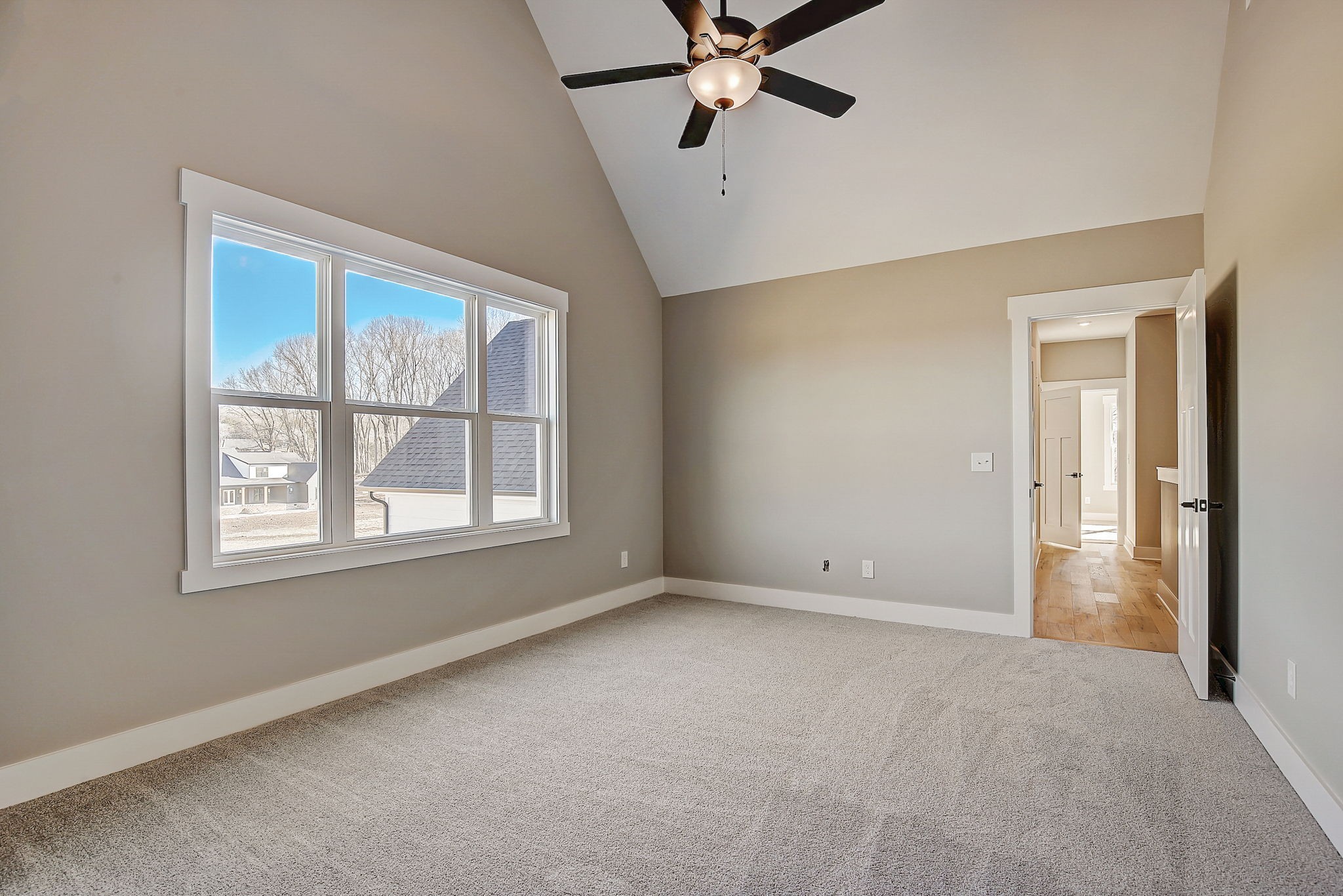 7311 North Milton Road Milton, TN 37118 - Photo 45 of 54 an empty room with windows and fan